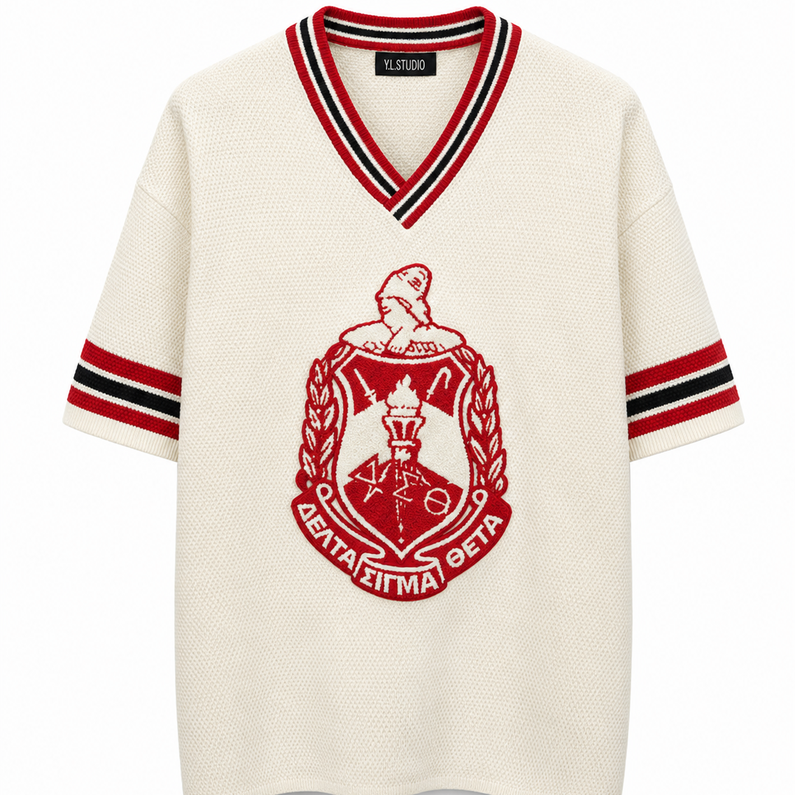 White sweater with red and black emblem and stripes on a white background