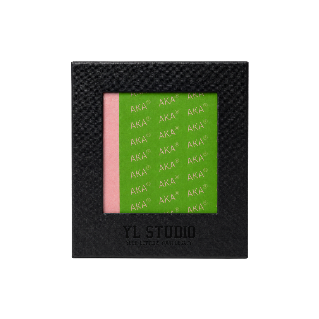 AKA pink and green pattern scarf inside a black branded YL STUDIO box