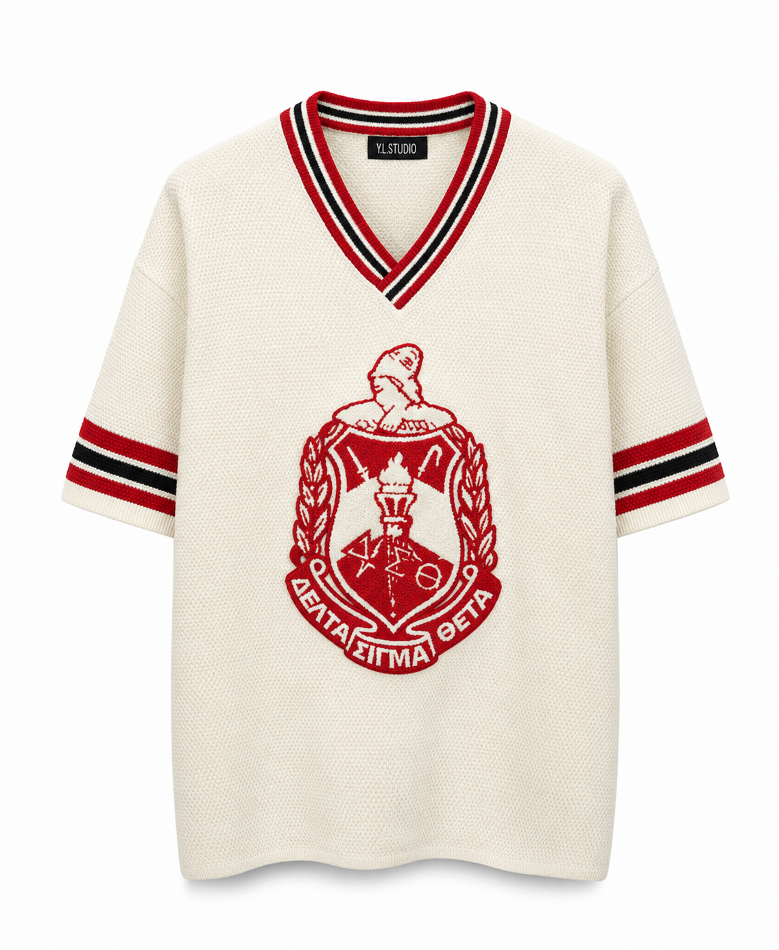 White sweater with red and black emblem and stripes on a white background
