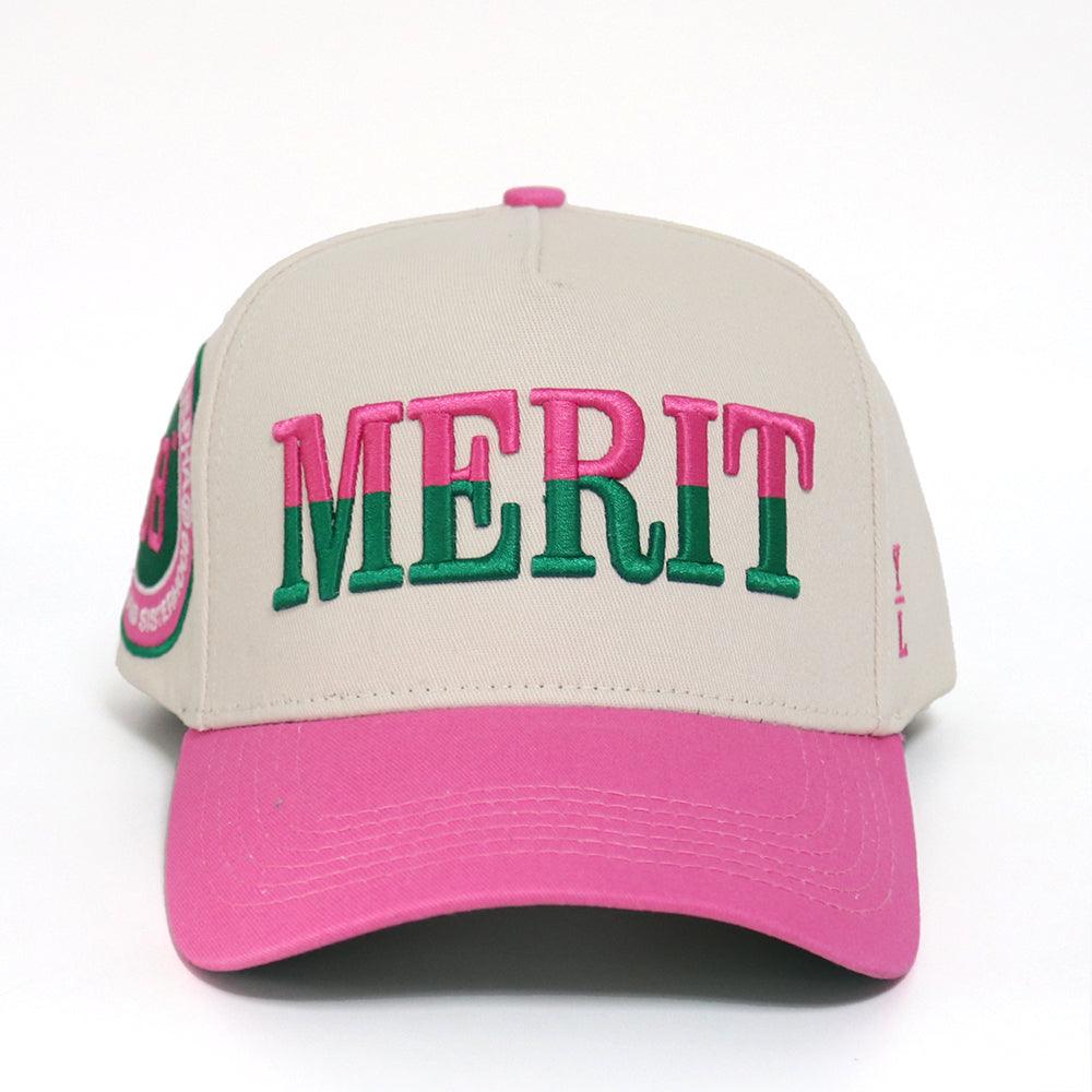 Beige and pink cap with 'MERIT' text on a white background