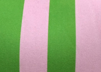 Close-up of green and pink striped fabric