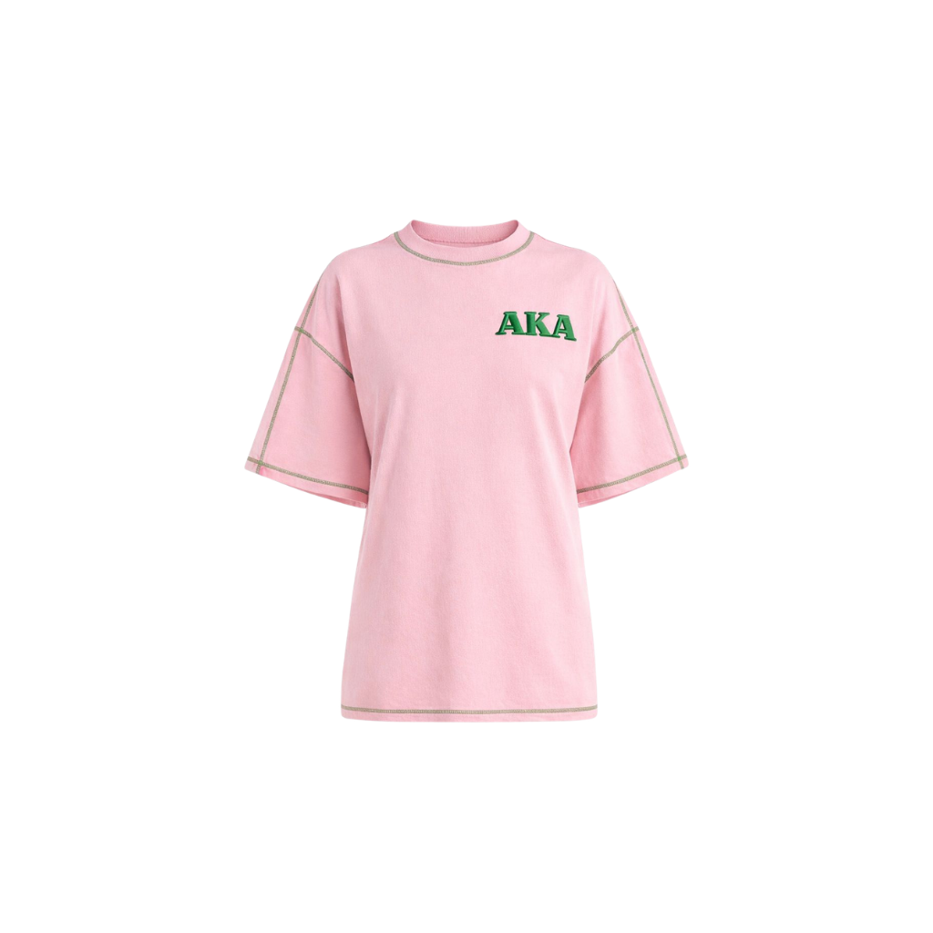 Pink t-shirt with 'AKA' letters on a white background